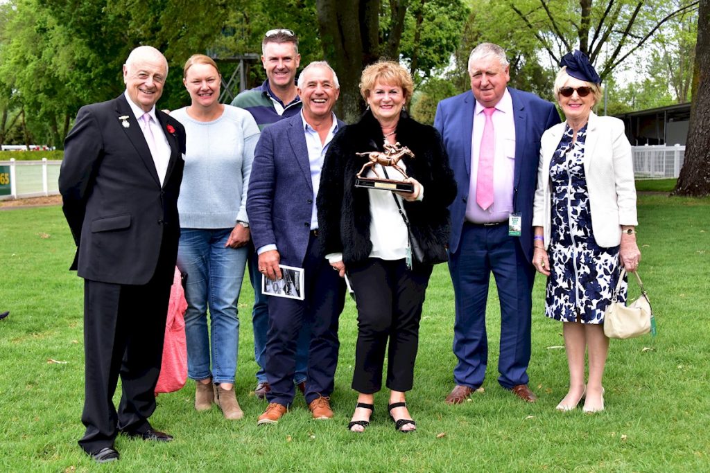 Owners of Angelic Spirit (NZ) and committee member Mike Rowland after winning the No Fuss Event Hire BM70 Handicap at Kyneton Racecourse on November 07, 2018 in Kyneton, Australia. (Brett McCarthy/Racing Photos)